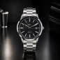 TEN Men’s Stainless Steel Quartz Watch with Grid Dial